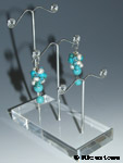 Prsentoirs mtallique de boucles d'oreilles sur socle acrylique transparent