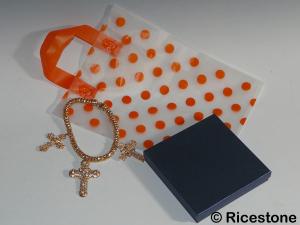 4) Sachet plastique fantaisie à pois orange.